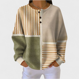 Luna - Suéter beige con patrón de rayas y patchwork